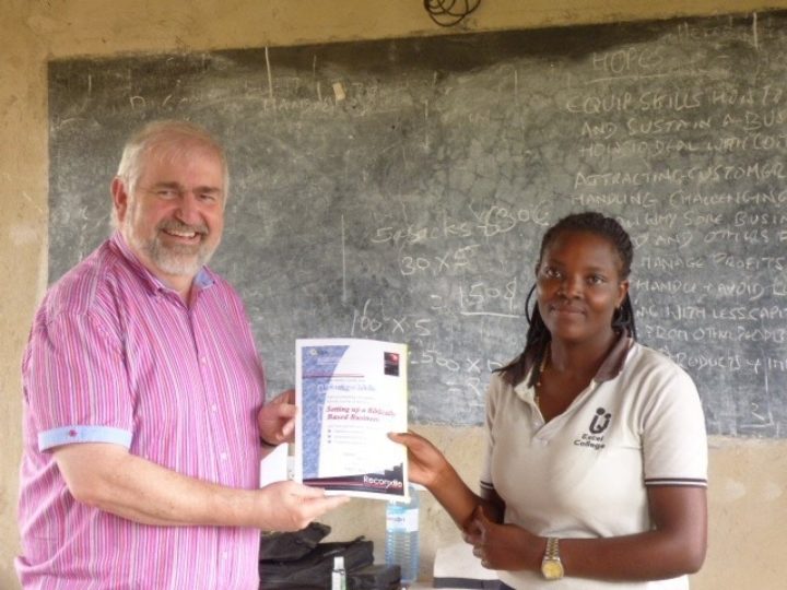 Mike awarding a certificate for completed training